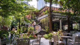 Garden Cafe and tourists in Thailand